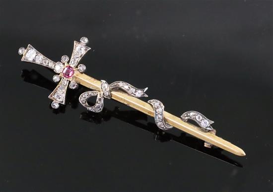 A late Victorian gold and silver, ruby, old and rose cut diamond set sword and ribbon bow brooch, 67mm.